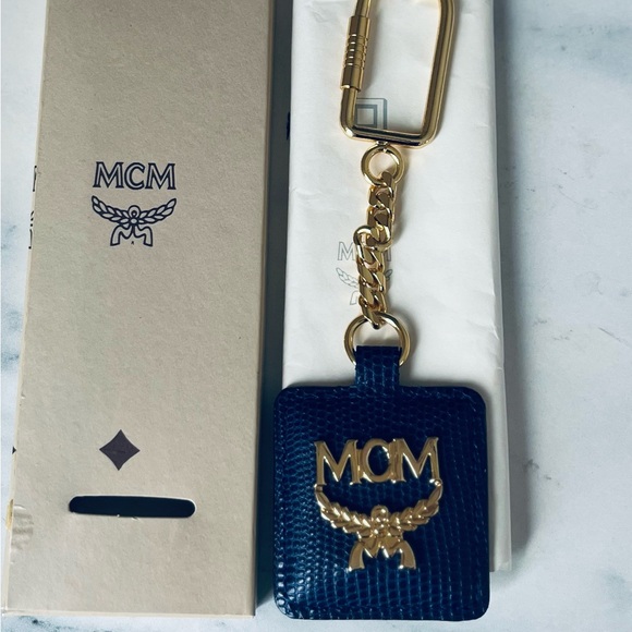 MCM Accessories - MCM Autentic Navy Keychain with Gold Details.
